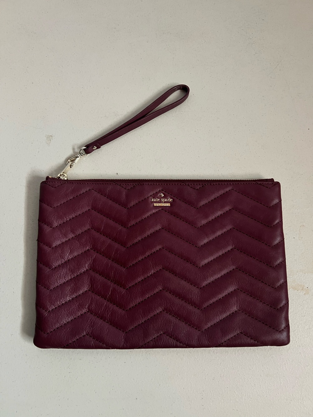 Kate Spade Quilted Chevron Wristlet Clutch in Wine